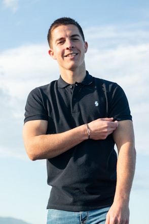 man in black polo shirt