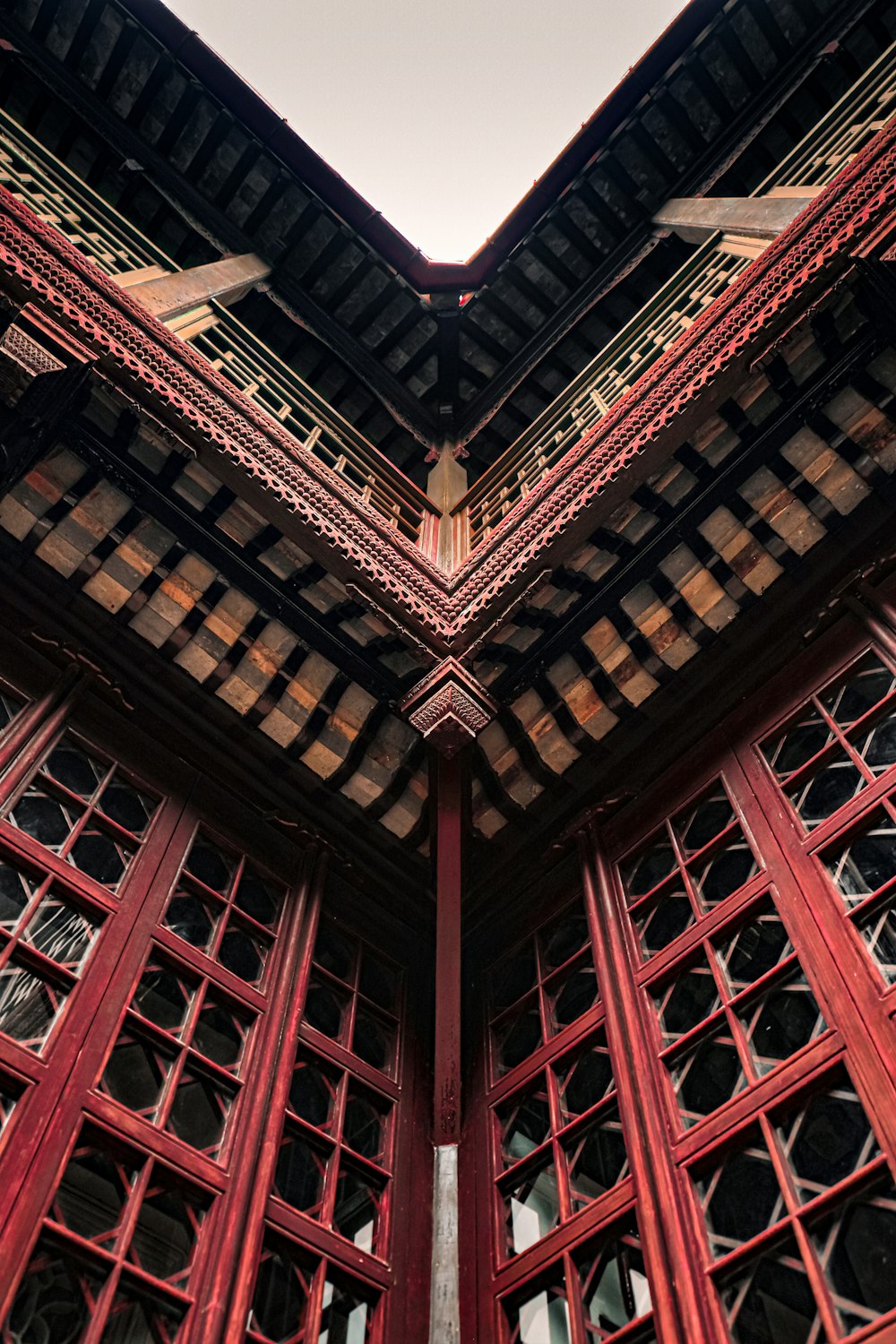 low angle photography of brown and black concrete building