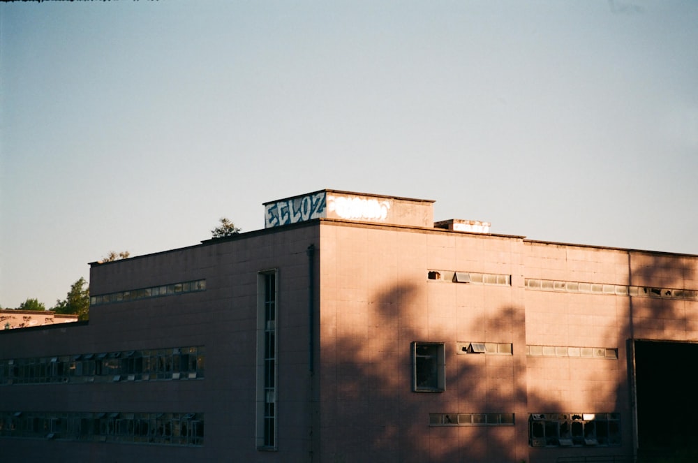 brown concrete building under blue sky during daytime