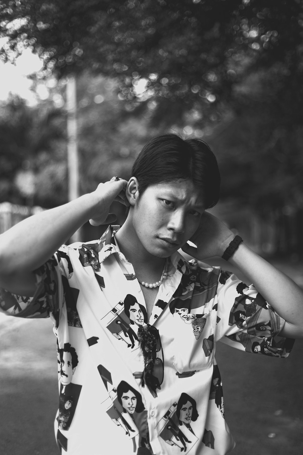 woman in white and black floral button up shirt