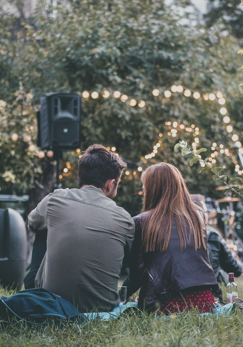 man and woman kissing during daytime