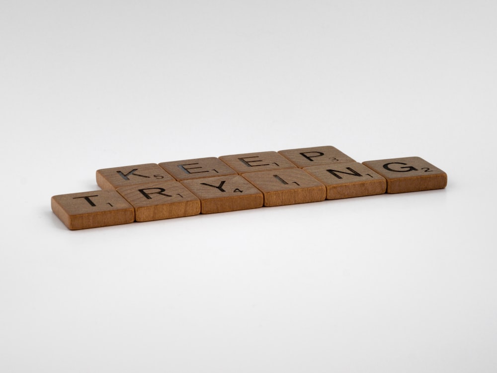 brown wooden blocks on white surface