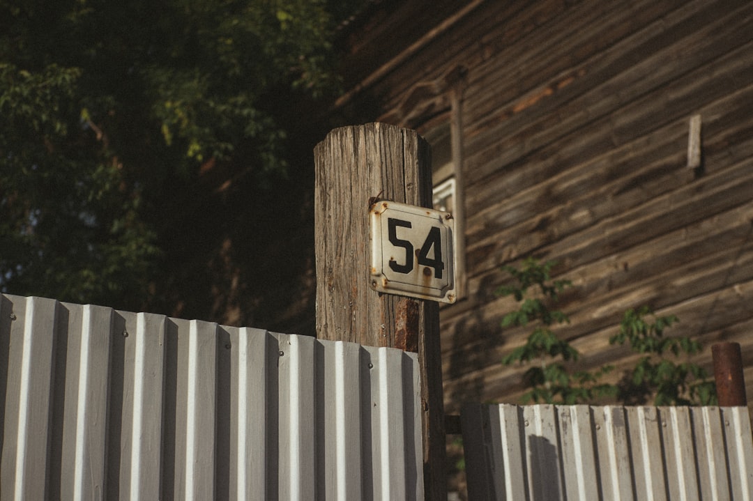 white and black wooden signage