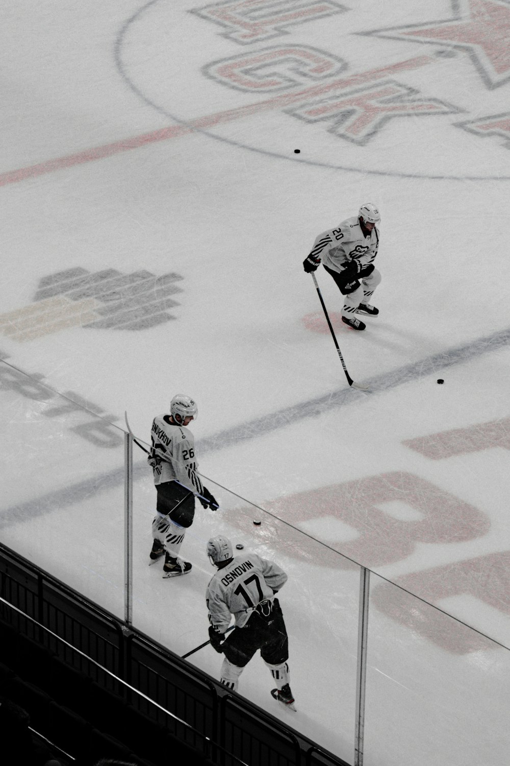 ice hockey players on ice hockey field