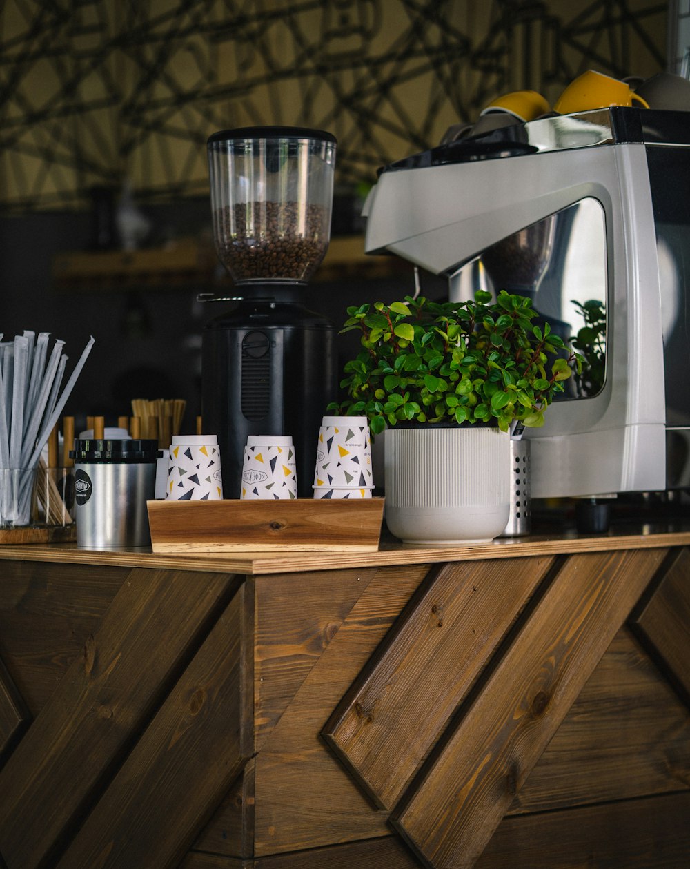 white ceramic mug on brown wooden table