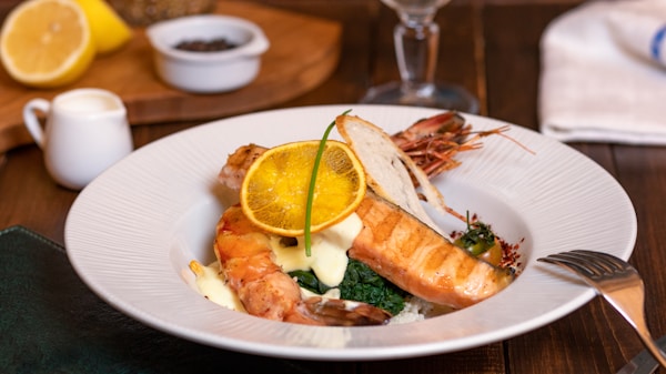 Fish dish on white ceramic plate