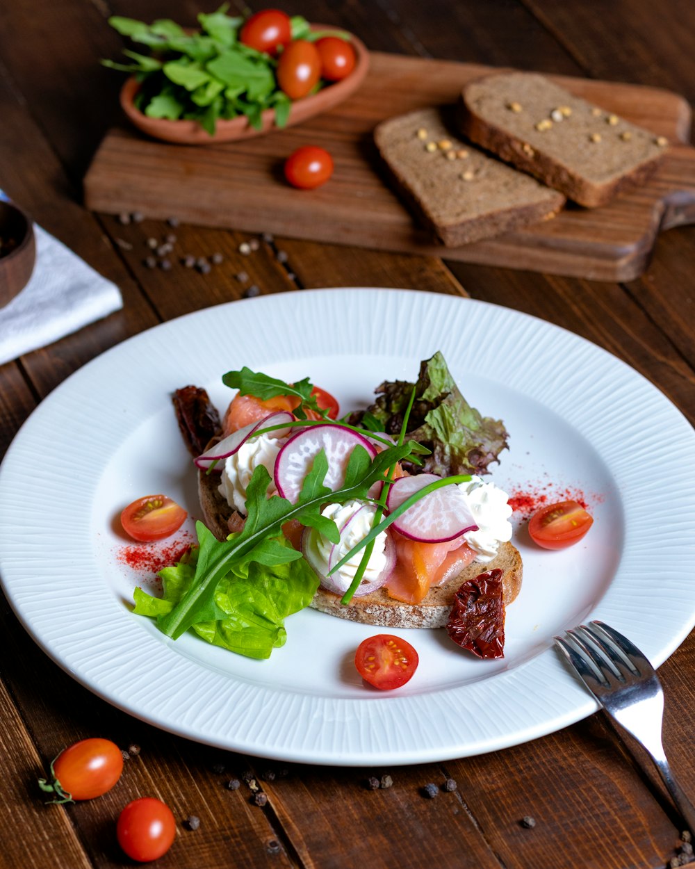 sliced meat with green vegetable on white ceramic plate