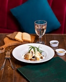 An inviting plate of a simple, colorful dish made from natural ingredients on a linen cloth.