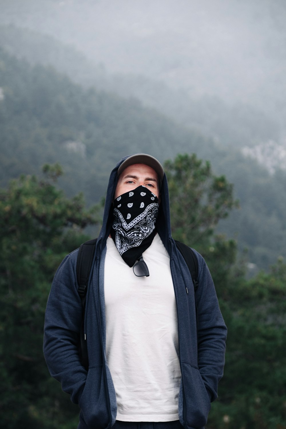 person in black and white mask and black jacket