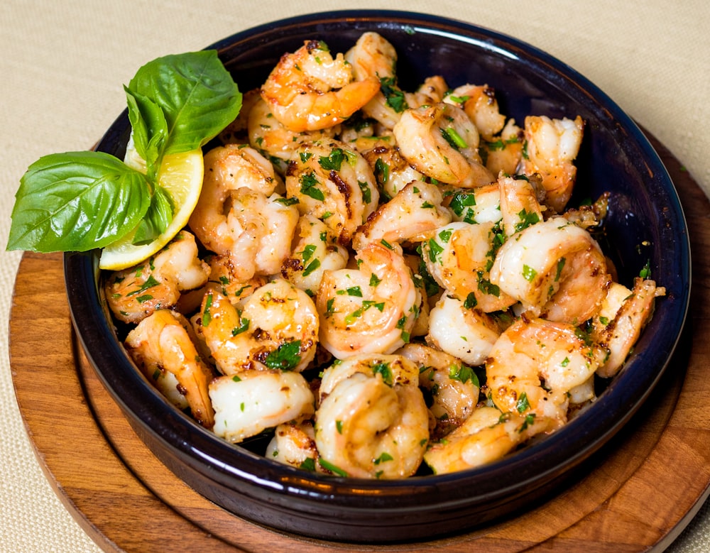 cooked food on black ceramic bowl