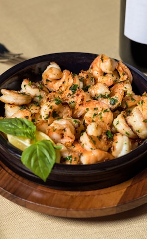 cooked food on brown wooden bowl