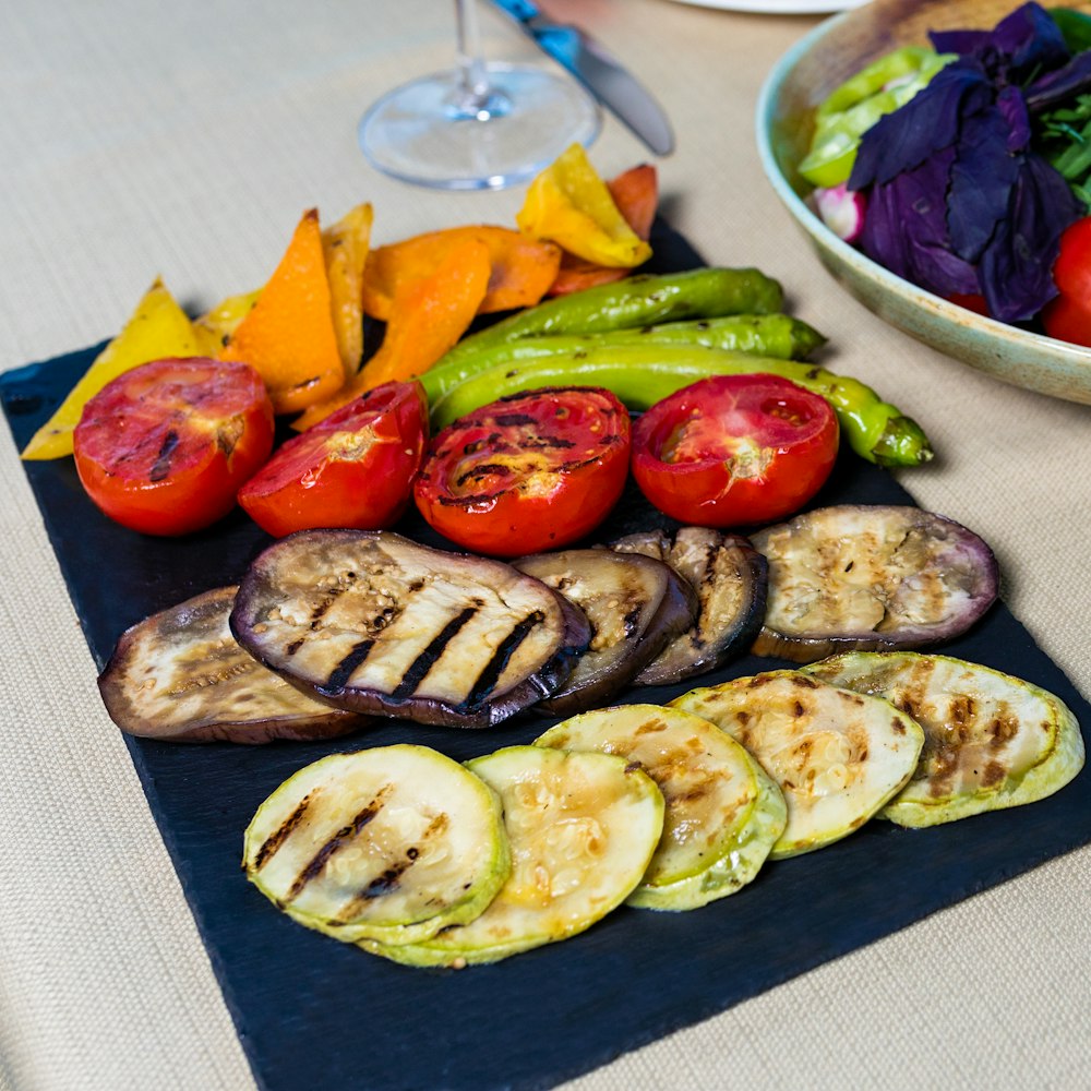 sliced vegetables on green ceramic plate