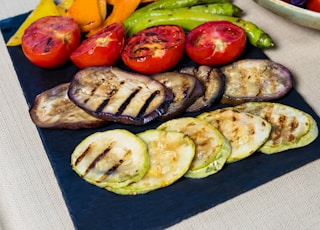 sliced vegetables on green ceramic plate