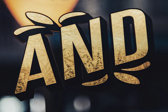 A sleek black background with golden letters spelling 'oronexo' in a modern, elegant style.