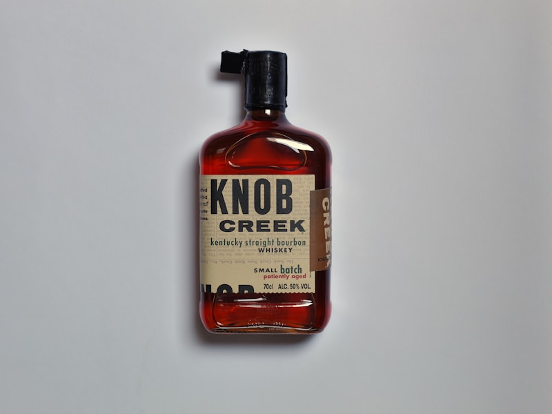 Bourbon bottle flat lay photo.