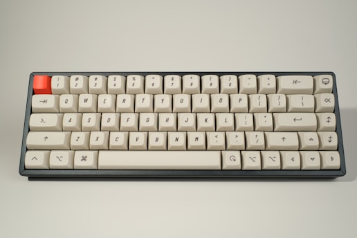 white computer keyboard on white surface