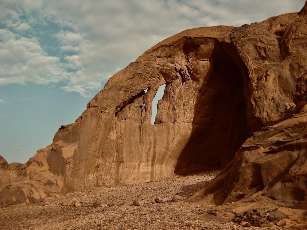 brown rock formation under blue sky during daytime