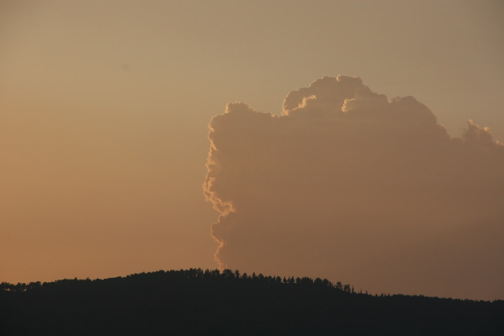 white clouds over the mountains