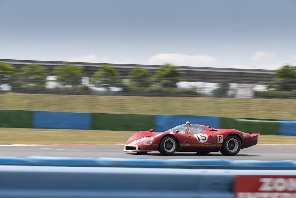 red ferrari 458 italia on road during daytime