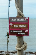 red and white wooden signage