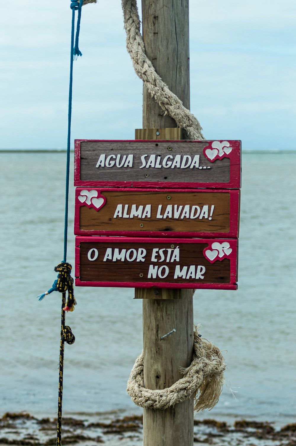 red and white wooden signage