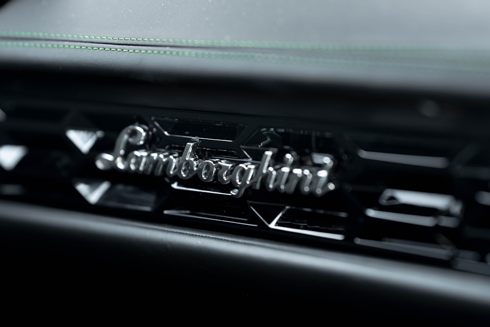 a close up of a car's emblem on a vehicle