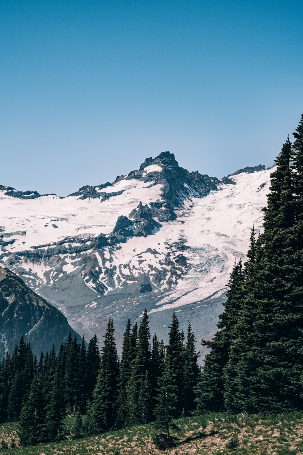 snow covered mountain during daytime