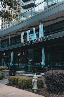 a fire hydrant sitting in front of a building