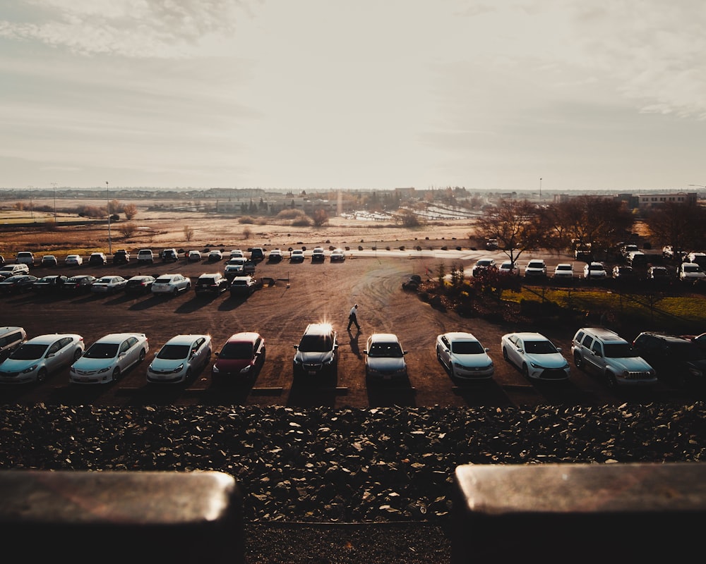 cars parked on parking lot during daytime