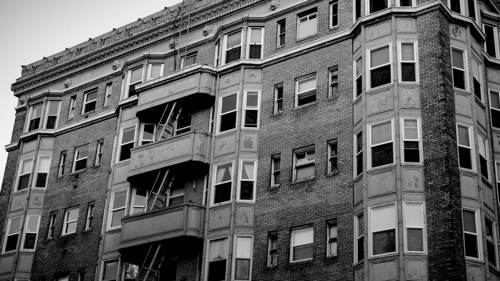 grayscale photo of concrete building