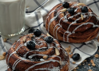 chocolate doughnut on white ceramic plate