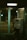 A dimly lit phone booth contains a vintage-style payphone attached to the wall. The booth has teal-colored metallic frames and glass windows with reflections. The outside environment is dark with blurred street lights in the background, suggesting it is nighttime.