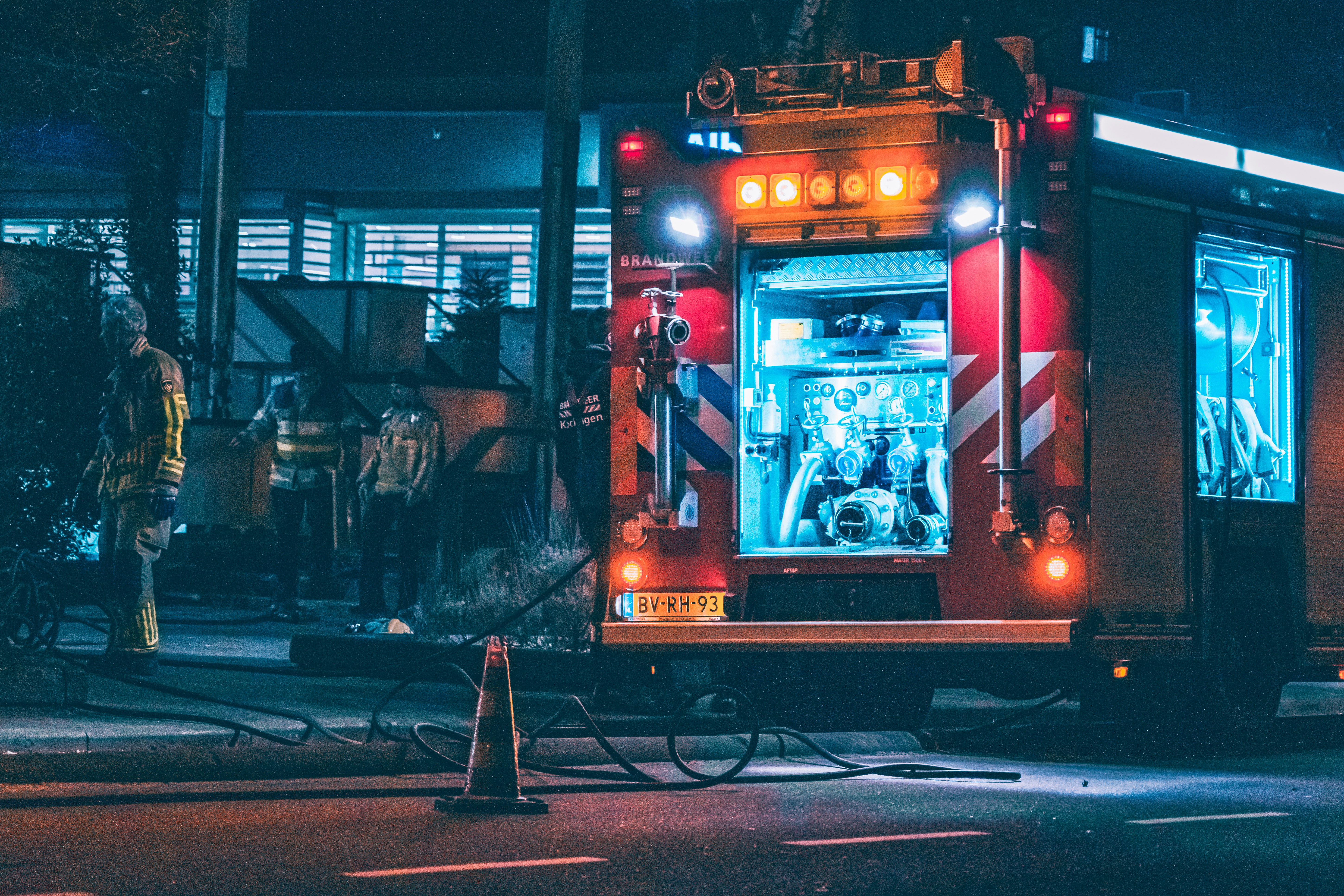 red and white lighted train during night time