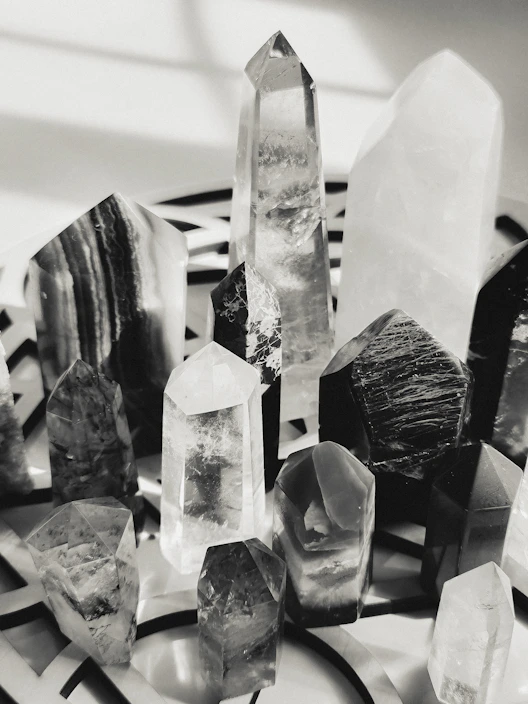 A beautifully arranged display of sparkling crystals in various shapes and sizes.