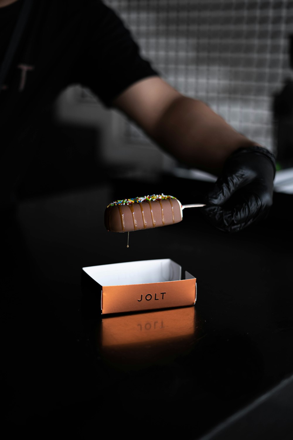 brown and white medication pill on brown wooden table