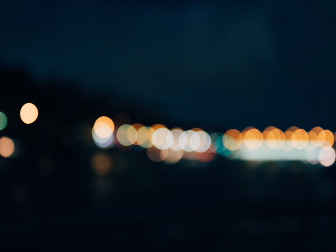 bokeh photography of city lights during night time