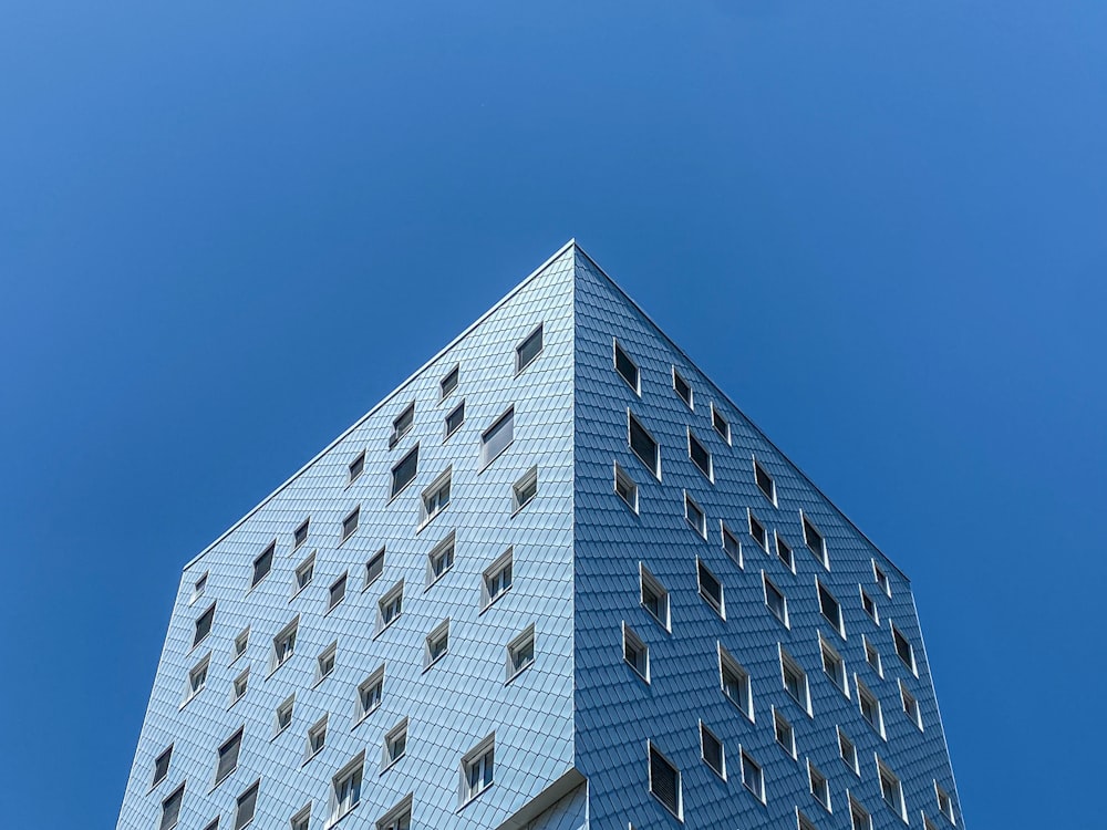 white concrete building under blue sky during daytime