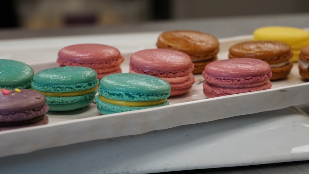 assorted flavor of donuts on white tray