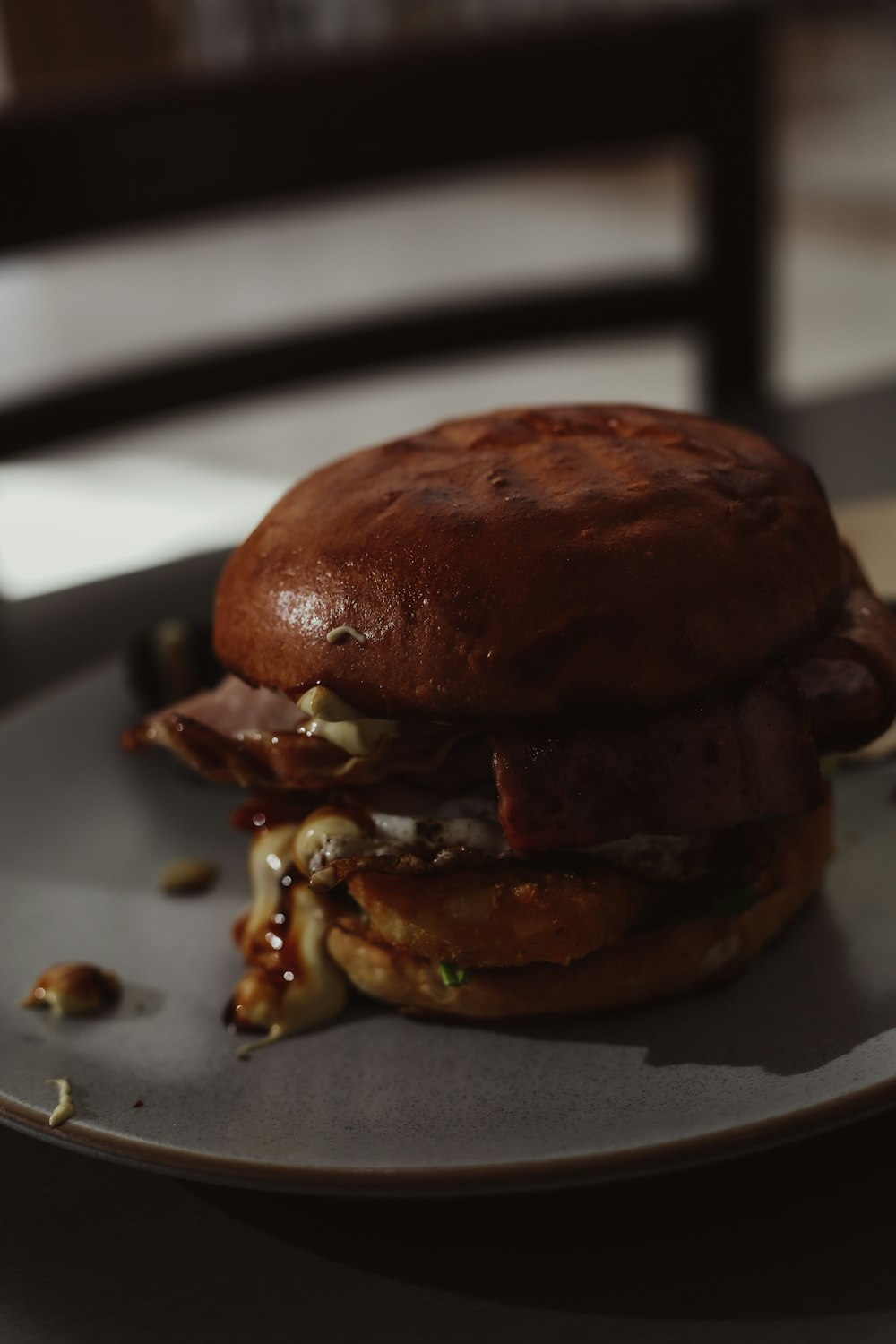 burger on white ceramic plate