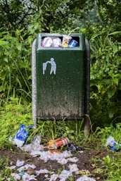 black and green trash bin