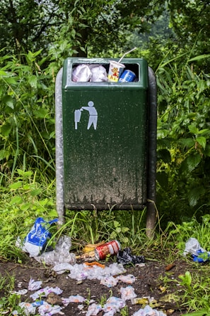 black and green trash bin