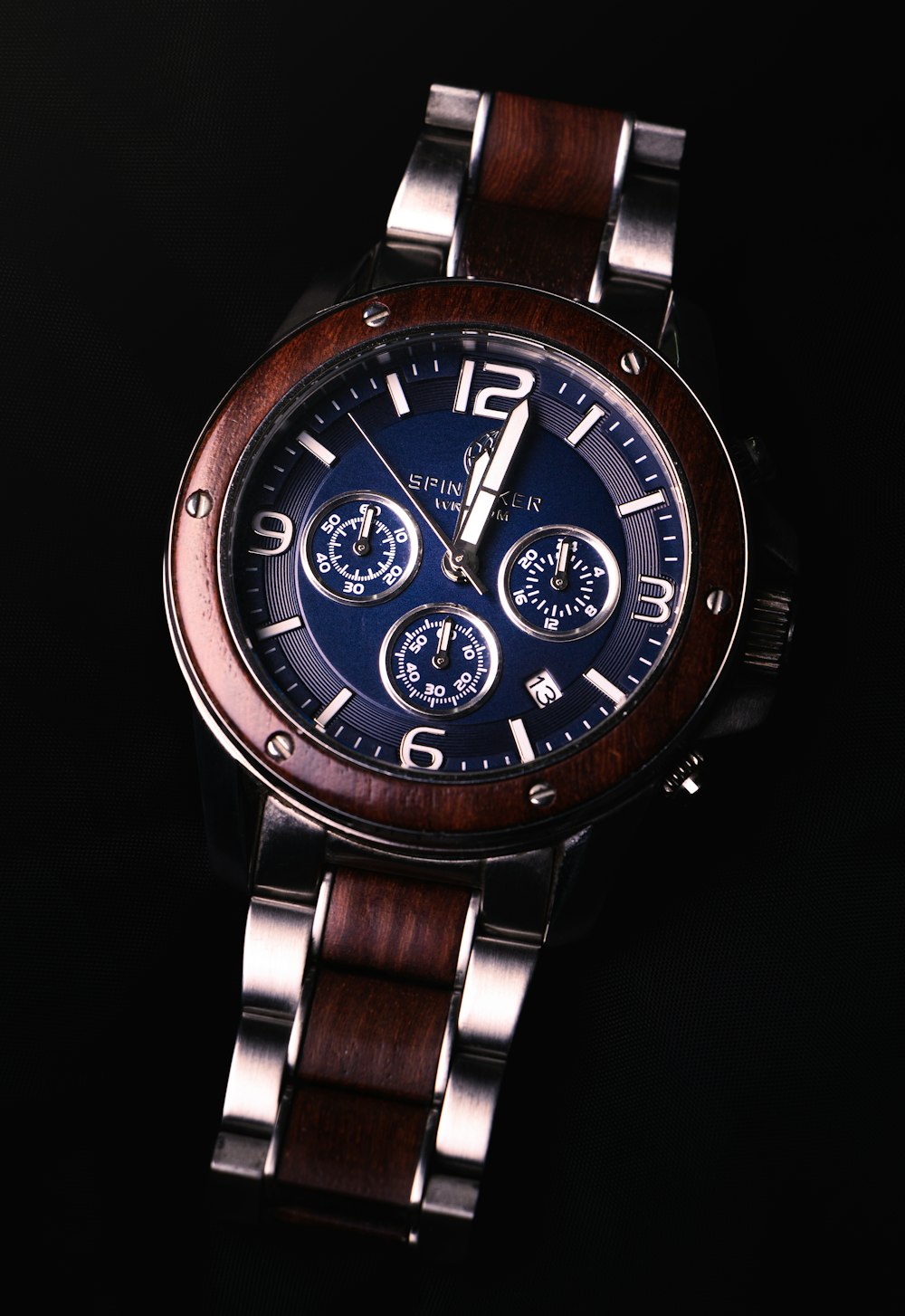 round silver and blue chronograph watch