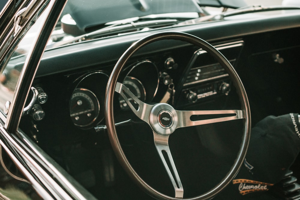 black and silver mercedes benz steering wheel