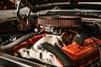 A detailed shot of a Toyota 2020 Camry AC compressor