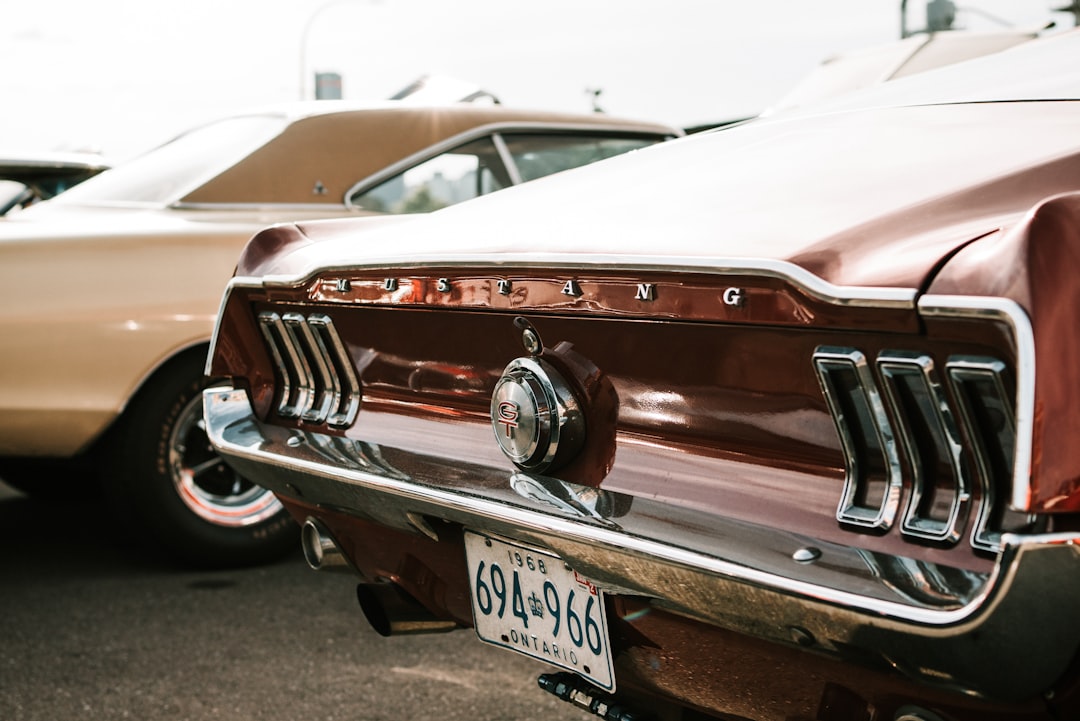 brown and white muscle car