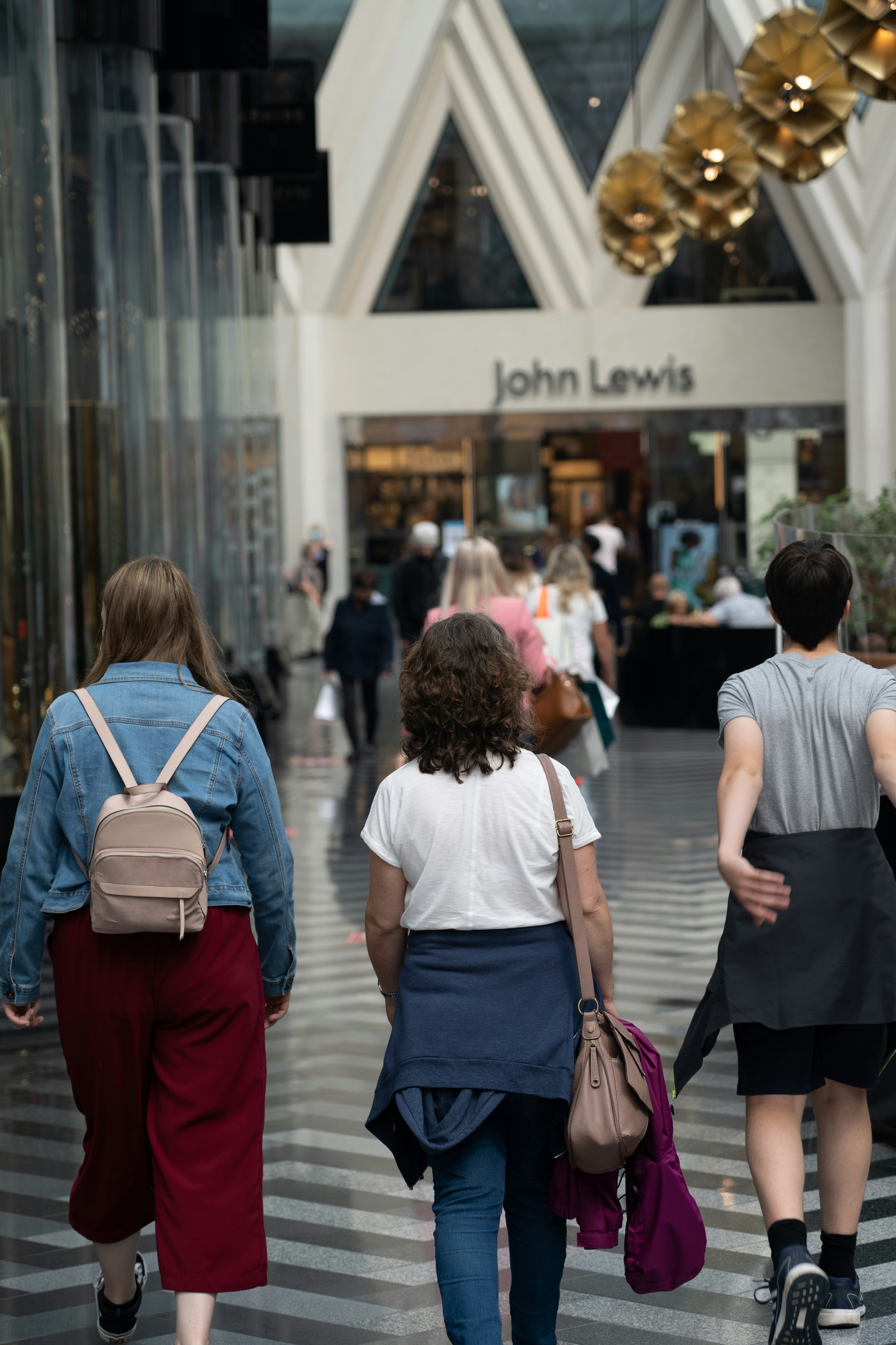 people walking on sidewalk during daytime