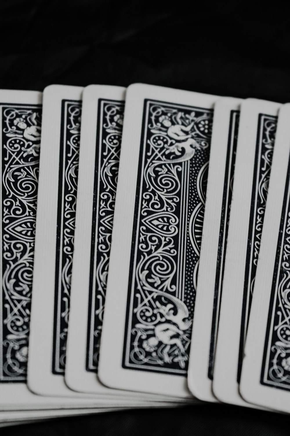 white and black floral textile