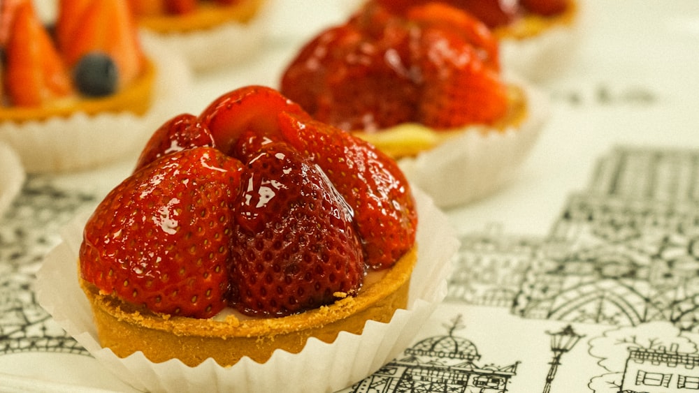 strawberry fruit on white ceramic bowl