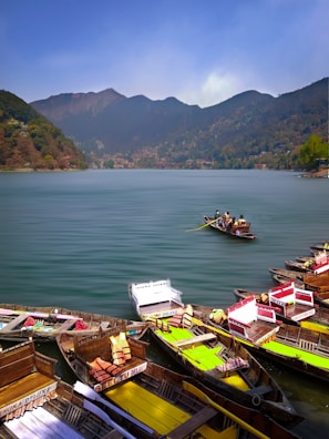 white and red boat on sea during daytime