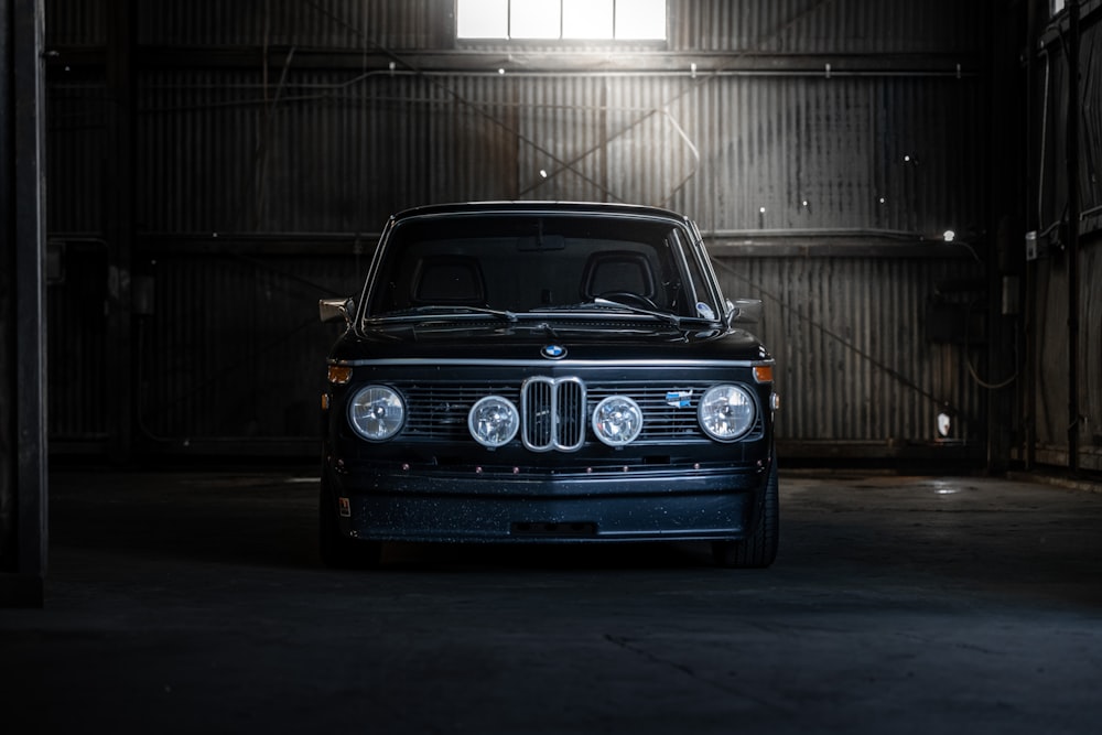 blue car in a garage